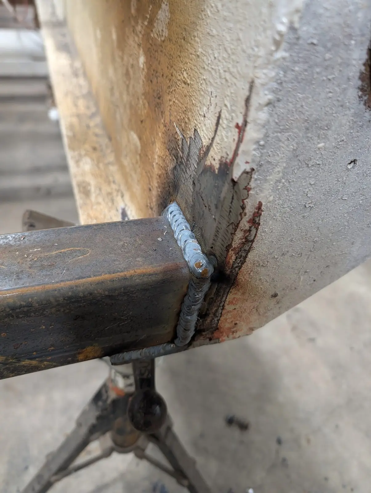 Close-up of a structural steel connection weld
